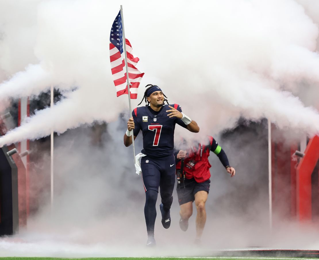 HOUSTON, TEXAS - NOVEMBER 19: C.J. Stroud #7 of the Houston Texans takes the field before the game against the Arizona Cardinals at NRG Stadium on November 19, 2023 in Houston, Texas. (Photo by Tim Warner/Getty Images)