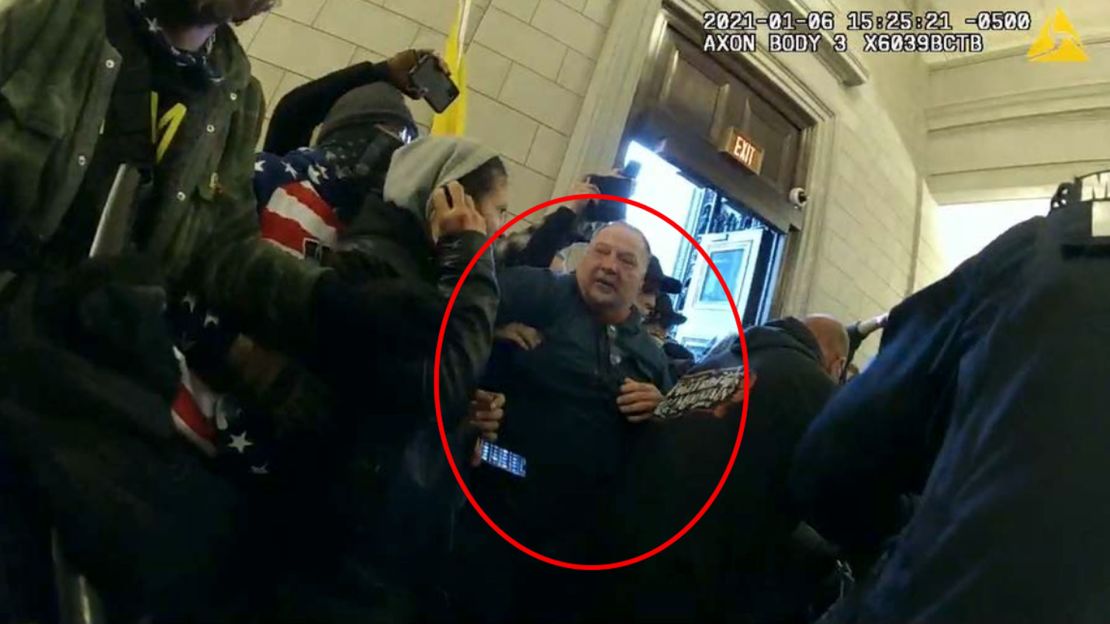This image, taken from a police officer's body camera video, shows Joseph W. Fischer at the Capitol riot on January 6, 2021, according to the Justice Department.