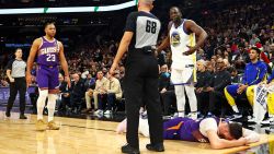Dec 12, 2023; Phoenix, Arizona, USA; Golden State Warriors forward Draymond Green (23) reacts after being called for a foul on Phoenix Suns center Jusuf Nurkic (20) during the third quarter at Footprint Center. Mandatory Credit: Mark J. Rebilas-USA TODAY Sports