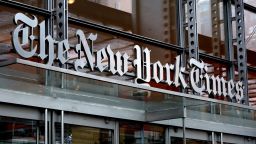 NEW YORK, NY - APRIL 29: The New York Times logo hangs above a doorway of their corporate headquarters on April 29, 2023, in New York City.  (Photo by Gary Hershorn/Getty Images)