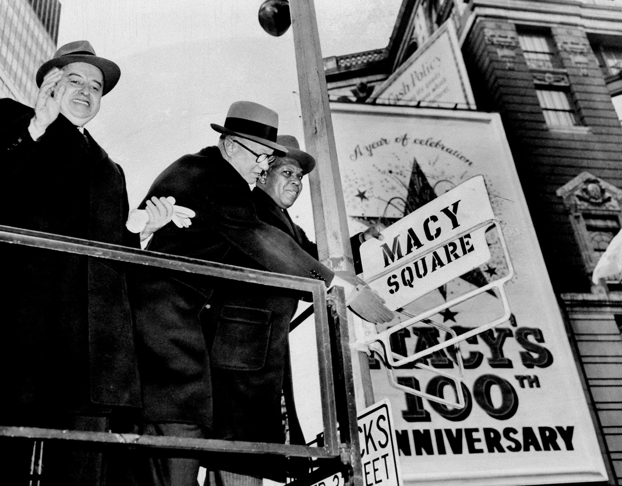 A street sign in New York is changed from Herald Square to Macy Square in 1958.