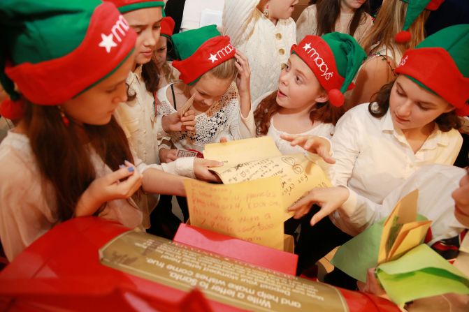 The Saxon Middle School Choir delivers their letters to Santa at a Macy's store in Bay Shore, New York, in 2015.