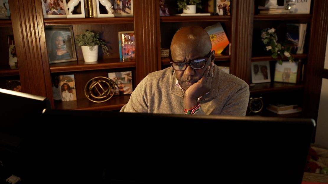 Bob Otondi, a Texas business owner whose mortgage application was denied by Navy Federal, working at home.