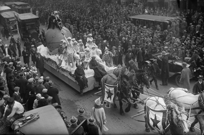 Santa Claus rides a float pulled by a team of horses during the Macy's Thanksgiving Day Parade in 1925. The parade made its debut in 1924.