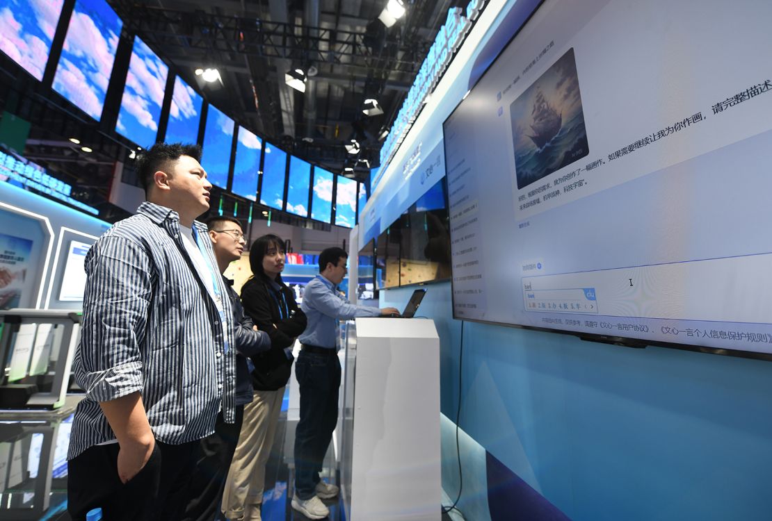 People learn about Baidu's artificial intelligence (AI) chatbot service ERNIE Bot during the 2nd Global Digital Trade Expo at Hangzhou International Expo Center in Hangzhou, Zhejiang Province, China on November 23, 2023.