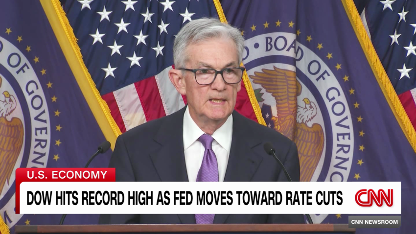 Dow reaches record high as Fed pivots toward rate cuts | CNN