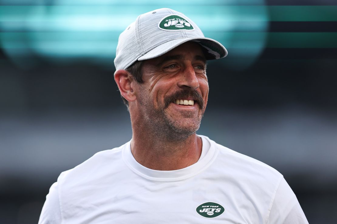EAST RUTHERFORD, NEW JERSEY - AUGUST 19: Aaron Rodgers #8 of the New York Jets warms up before the preseason game against the Tampa Bay Buccaneers at MetLife Stadium on August 19, 2023 in East Rutherford, New Jersey. (Photo by Dustin Satloff/Getty Images)