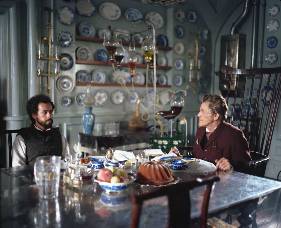 Ramy Youssef and Willem Dafoe in POOR THINGS. Photo by Yorgos Lanthimos. Courtesy of Searchlight Pictures.© 2023 Searchlight Pictures All Rights Reserved.