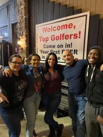 <strong>Fun times: </strong>Renee, Alanah, Laura, Carlos and Q are photographed here at a golfing spot."It's just really cool that this happened out of a fluke of a flight getting canceled. We met these great people that we're legit still friends with," says Alanah.<br />