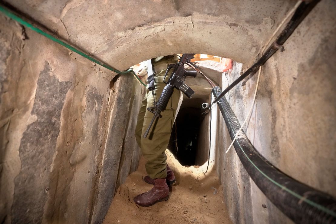 An Israeli soldier stands in an underground tunnel found underneath Shifa Hospital in Gaza City, Wednesday, Nov. 22, 2023. Israel says that Hamas militants sought cover on the grounds of the hospital and used the tunnel for military purposes.