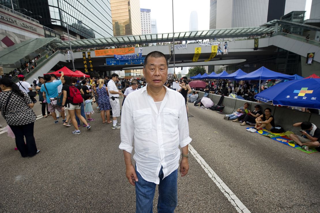 Jimmy Lai, CEO of Next Media and famous critic of Beijing policies, stands in the crowd taking part in a sit-in called 'Occupy Central' or 'Umbrella revolution' in Connaught road, Admirality, Hong Kong, on October 2, 2014.