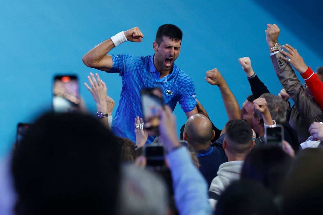 MELBOURNE, AUSTRALIA - JANUARY 29: Novak Djokovic of Serbia celebrates winning championship point in the Men's Singles Final against Stefanos Tsitsipas of Greece during day 14 of the 2023 Australian Open at Melbourne Park on January 29, 2023 in Melbourne, Australia. (Photo by Darrian Traynor/Getty Images)