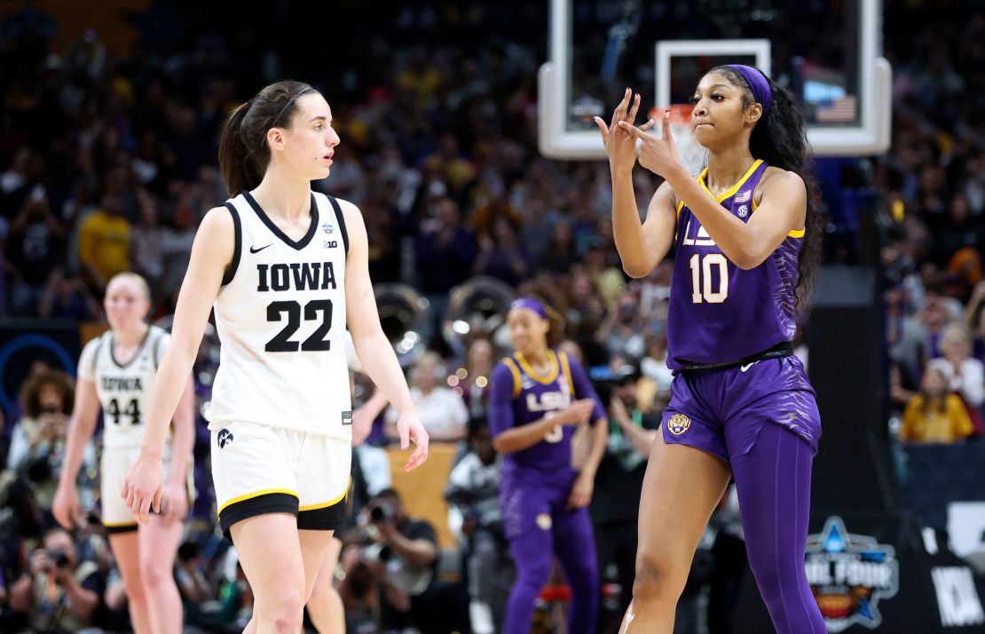 Apr 2, 2023; Dallas, TX, USA; LSU Lady Tigers forward Angel Reese (10) gestures to Iowa Hawkeyes guard Caitlin Clark (22) after the game during the final round of the Women's Final Four NCAA tournament at the American Airlines Center. Mandatory Credit: Kevin Jairaj-USA TODAY Sports