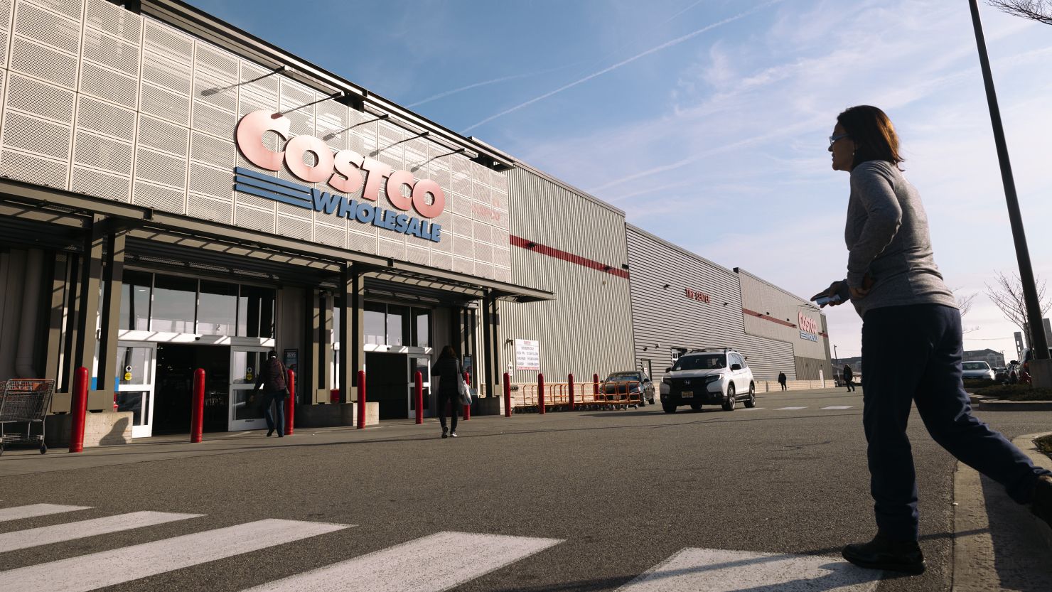 Shoppers outside a Costco store in Bayonne, New Jersey, US, on Saturday, Dec. 9, 2023. Costco Wholesale Corp. is scheduled to release earnings figures on December 14.