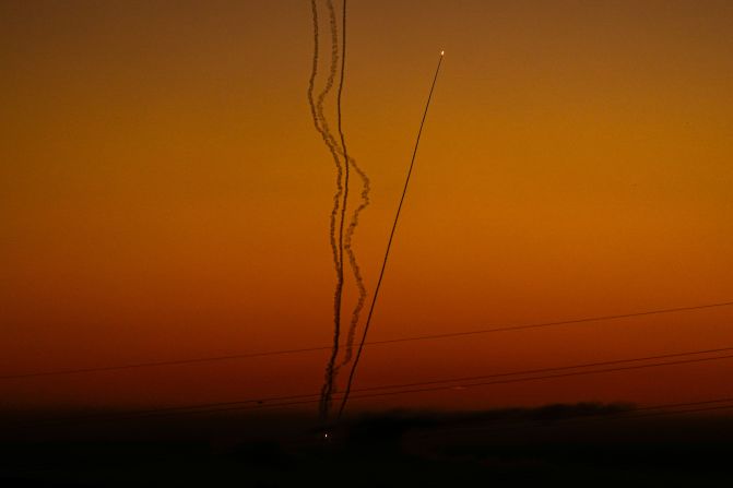 Rockets are fired toward Israel from Gaza, as seen from southern Israel, on December 15.