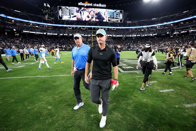 Los Angeles Chargers head coach Brandon Staley walks off of the field after losing 63-21 to the Las Vegas Raiders on Thursday, December 14. <a href="index.php?page=&url=https%3A%2F%2Fwww.cnn.com%2F2023%2F12%2F15%2Fsport%2Flos-angeles-chargers-fire-brandon-staley-tom-telesco-spt-intl%2Findex.html" target="_blank">Staley and general manager Tom Telesco were fired the next day</a>. The game was a franchise record for points scored by the Raiders, and a franchise worst for points allowed by the Chargers, <a href="index.php?page=&url=https%3A%2F%2Fwww.nfl.com%2Fnews%2Frookie-qb-aidan-o-connell-propels-raiders-to-historic-blowout-over-chargers" target="_blank" target="_blank">per NFL.com</a>.