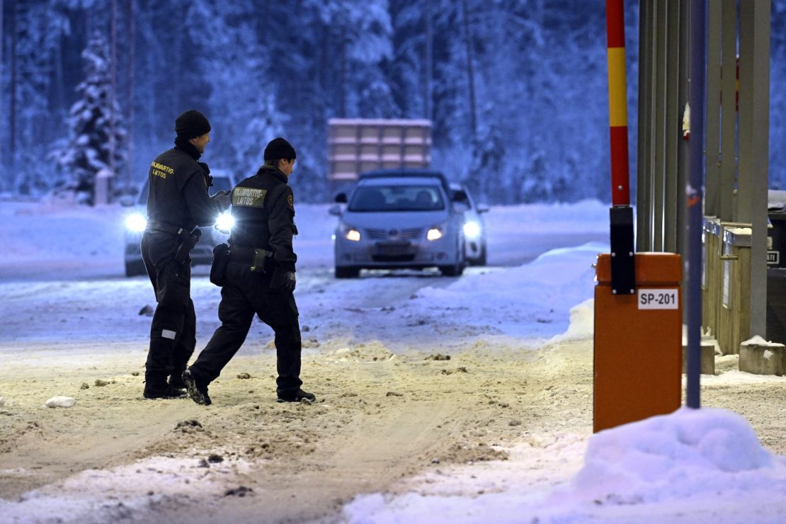 Finnish border guards at Vaalimaa border check point between Finland and Russia in Virolahti, Finland on December15, 2023. Finland will close its eastern border with Russia, its interior minister said on December 14, 2023, hours after reopening it following a spike in migrant crossings that Helsinki has labelled a Russian hybrid attack. Finland, which shares a 1,340-kilometre (830-mile) border with Russia, will close the border on Friday at 8:00 pm (1800 GMT) until January 14, 2024, Interior Minister Mari Rantanen said at a press conference. (Photo by Heikki Saukkomaa / Lehtikuva / AFP) / Finland OUT