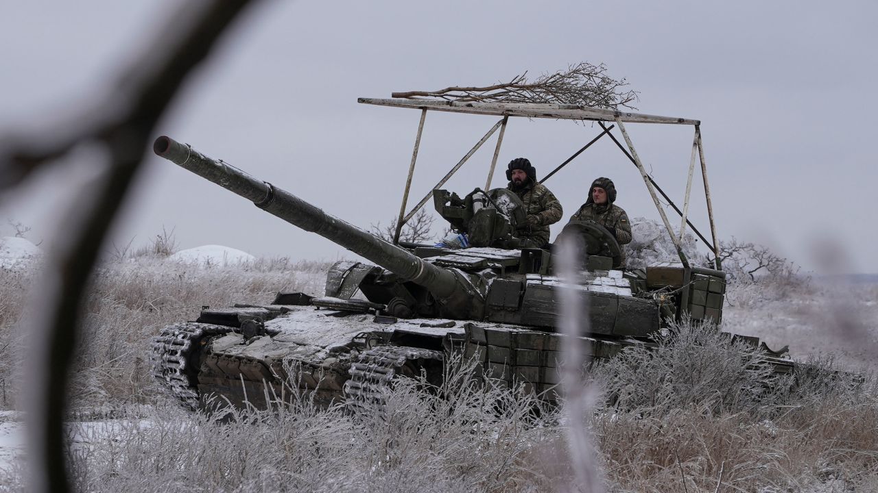 Ukrainian servicemen of the 92nd Ivan Sirko Separate Assault Brigade ride in a T-64 tank near the town of Bakhmut, amid Russia's attack on Ukraine, in Donetsk region, Ukraine December 13, 2023. REUTERS/Inna Varenytsia
