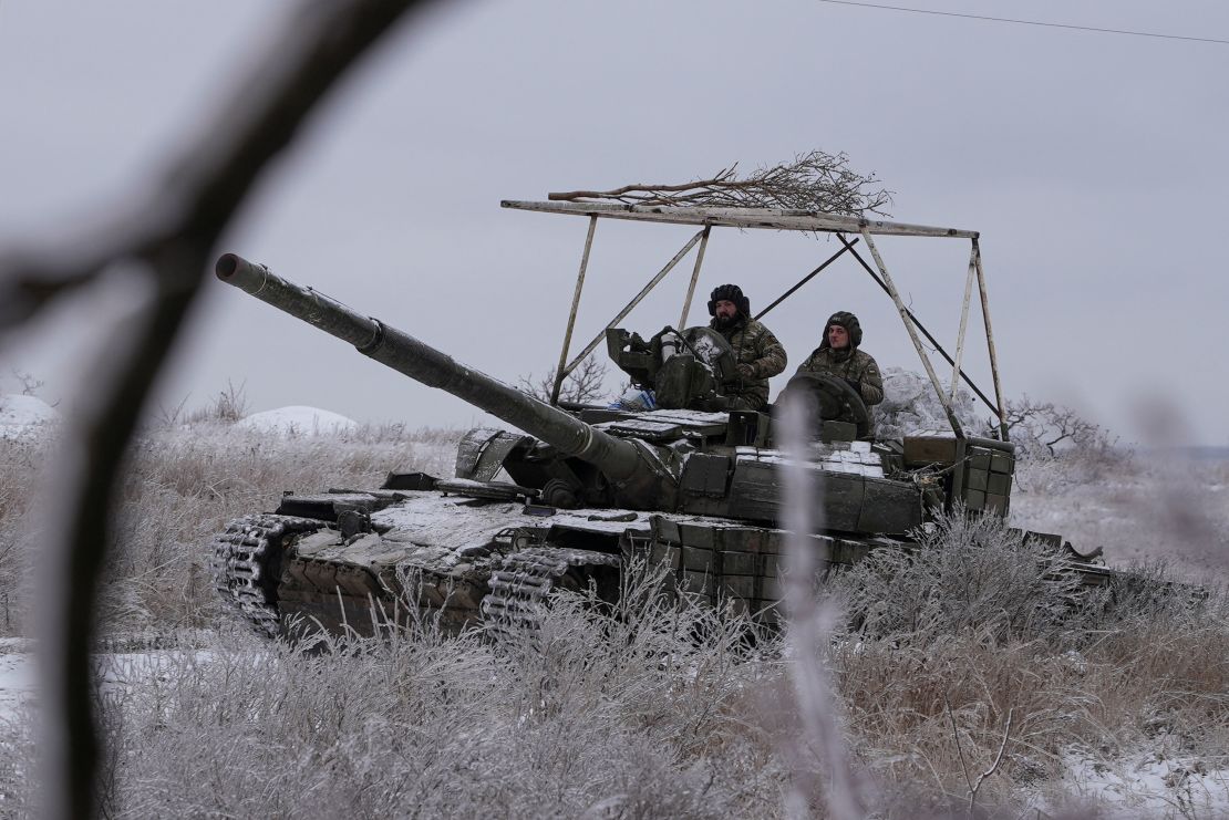 Ukrainian servicemen of the 92nd Ivan Sirko Separate Assault Brigade ride in a T-64 tank near the town of Bakhmut, amid Russia's attack on Ukraine, in Donetsk region, Ukraine December 13, 2023. REUTERS/Inna Varenytsia