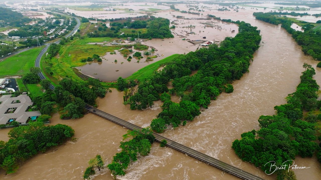 An aerial view shows flooding caused by heavy rains and water gushing through the Barron River, in Cairns, Queensland, Australia December 18, 2023.