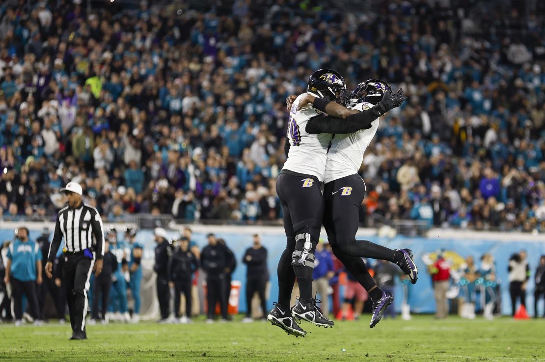 JACKSONVILLE, FL - DECEMBER 17: Baltimore Ravens quarterback Lamar Jackson (8) and Baltimore Ravens offensive tackle Ronnie Stanley (79) celebrate a touchdown during the game between the Jacksonville Jaguars and the Baltimore Ravens on December 17, 2023 at EverBank Stadium in Jacksonville, Fl. (Photo by David Rosenblum/Icon Sportswire via Getty Images)
