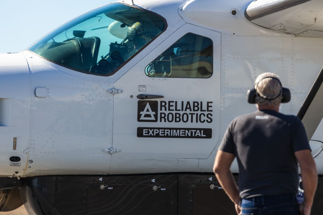 The crew preparing the Cessna Caravan for the unmanned flight.