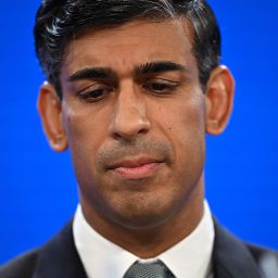 Britain's Prime Minister Rishi Sunak addresses delegates at the annual Conservative Party Conference in Manchester, northern England, on October 4, 2023. (Photo by Oli SCARFF / AFP) (Photo by OLI SCARFF/AFP via Getty Images)