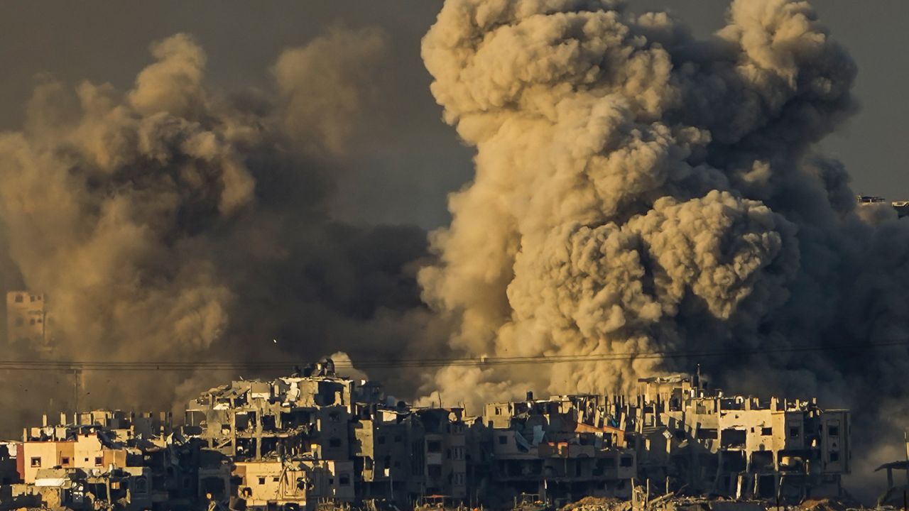 Smoke rises following an Israeli bombardment in the Gaza Strip, as seen from southern Israel, on December 16, 2023.