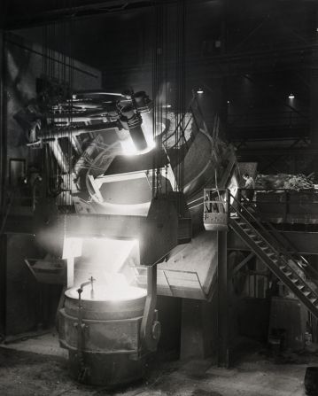 An electric furnace is tilted to pour 40 tons of stainless steel at a plant in Pennsylvania in 1945.