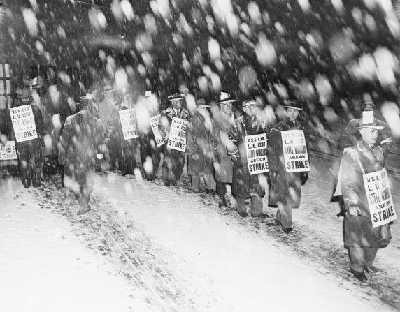 Striking steelworkers picket in Homestead, Pennsylvania, in 1946. An estimated 750,000 workers took part in the walkout, shutting down 1,200 plants in 30 states.