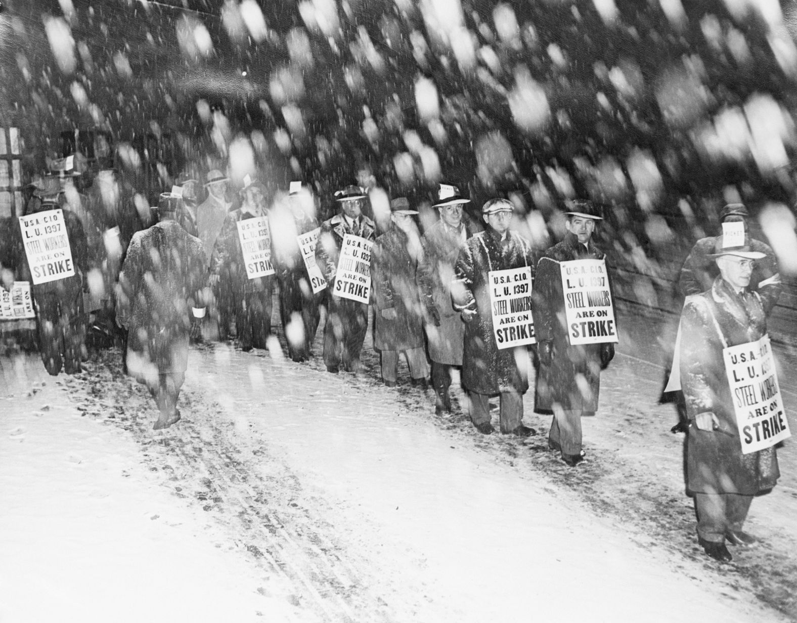 Striking steelworkers picket in Homestead, Pennsylvania, in 1946. An estimated 750,000 workers took part in the walkout, shutting down 1,200 plants in 30 states.