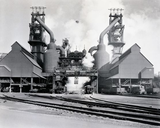 New twin blast furnaces operate at US Steel's South Chicago Works in 1956. They were among the world's largest at the time, standing 235 feet tall.