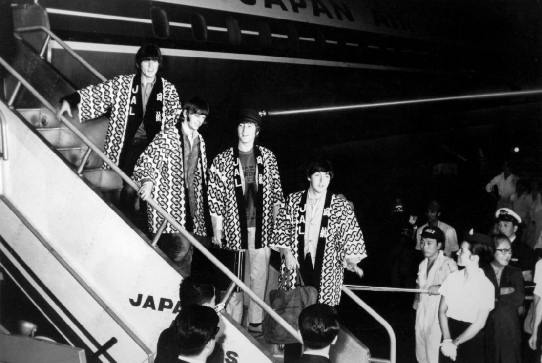TOKYO, JAPAN - JULY: The Beatles arrive at Tokyo airport for their japanese tour in July 1966 in Tokyo, Japan. (Photo by Keystone-France/Gamma-Rapho via Getty Images)