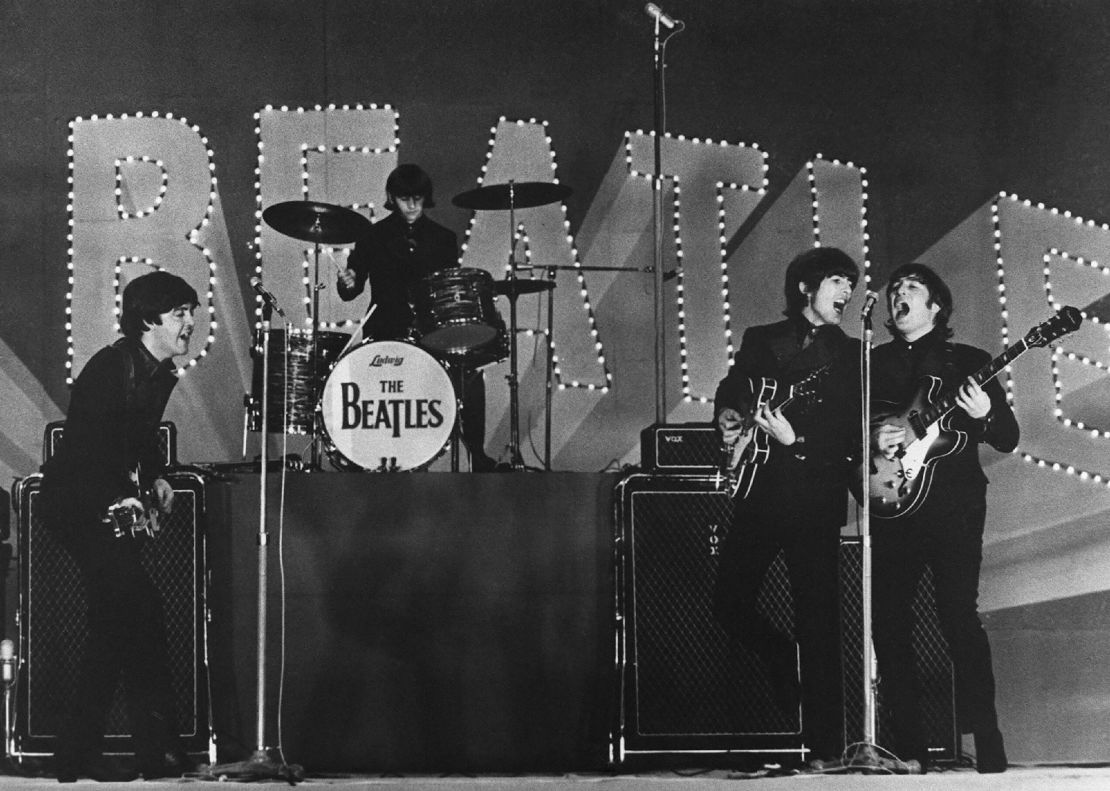This photo taken on June 30, 1966 shows British band The Beatles, (L to R) Paul McCartney, Ringo Starr, George Harrison and John Lennon, performing during their concert at the Budokan in Tokyo. - A group of Japanese Beatles fans on October 30, 2018 have lost their bid to get police to hand over historic footage of the band's legendary 1966 Japan visit. (Photo by JIJI PRESS / JIJI PRESS / AFP) / Japan OUT        (Photo credit should read JIJI PRESS/AFP via Getty Images)