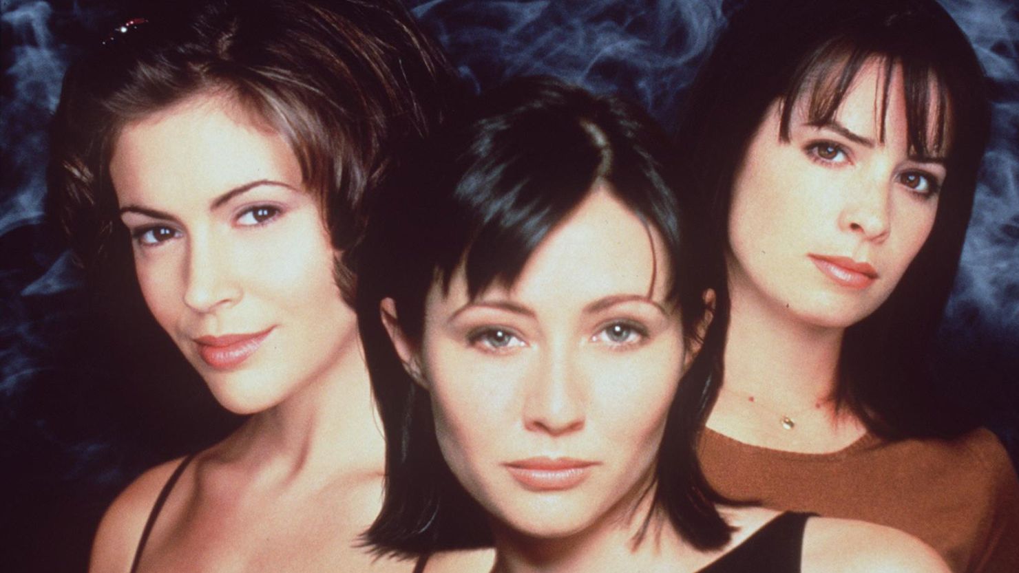 The Cast Of "Charmed." From L-R: Alyssa Milano As Phoebe Halliwell, Shannen Doherty As Prue Halliwell And Holly Marie Combs As Piper Halliwell. (Photo By Getty Images)
