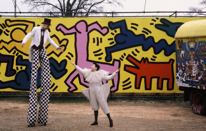 And here, performers pose in front of a mural Haring also contributed to Luna Luna. © Keith Haring Foundation/licensed by Artestar, New York. 