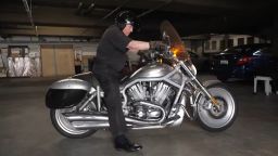 Monsignor Frank Hicks of the Los Angeles Police Department Chaplain Corps on his 2002 Harley Davidson V-Rod motorcycle.