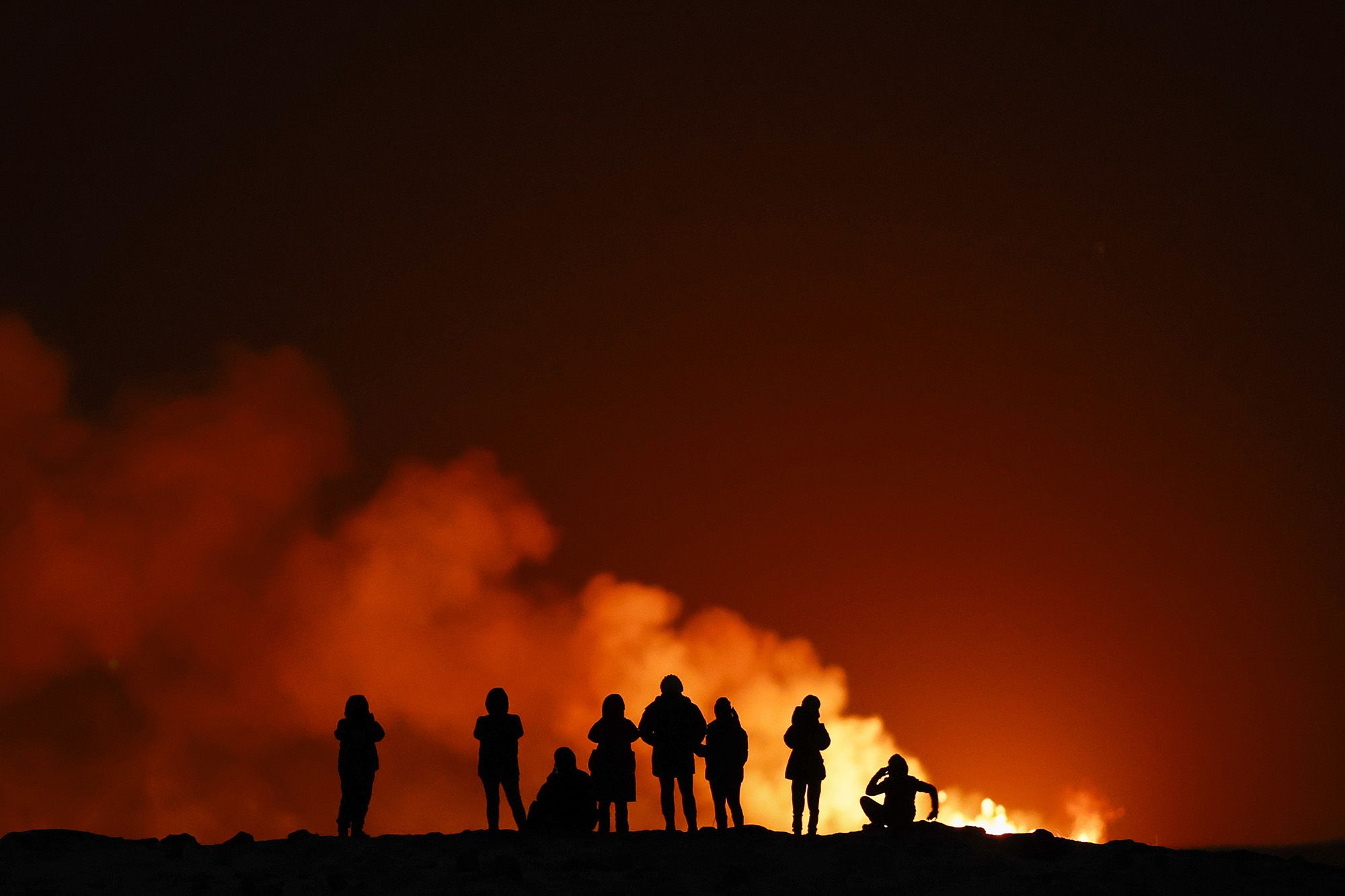 People view the volcano on the Reykjanes peninsula in southwest Iceland.