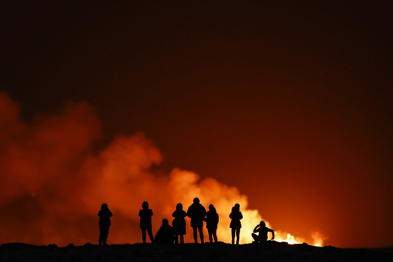 People view the volcano on the Reykjanes peninsula in south west Iceland.
