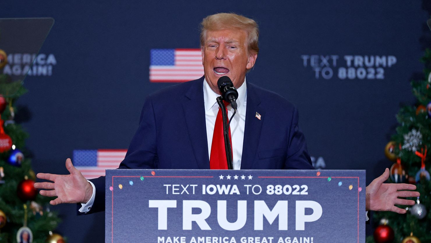 Former US President and 2024 presidential hopeful Donald Trump speaks during a campaign event in Waterloo, Iowa, on December 19, 2023.