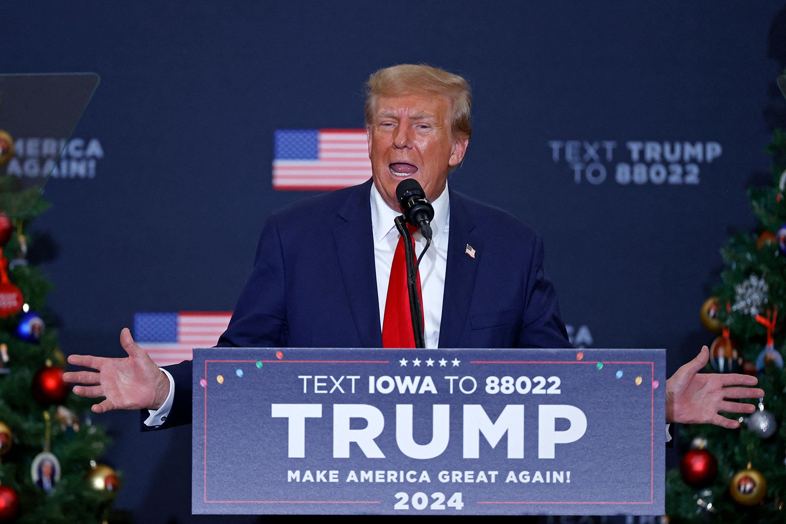 Former US President and 2024 presidential hopeful Donald Trump speaks during a campaign event in Waterloo, Iowa, on December 19, 2023.