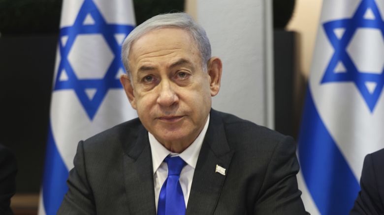 Israeli Prime Minister Benjamin Netanyahu chairs a cabinet meeting at the Kirya, which houses the Israeli Ministry of Defence, in Tel Aviv, Israel, Sunday, Dec. 17, 2023. (Menahem Kahana/Pool Photo via AP)
