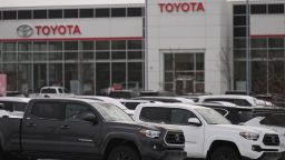 EDMONTON, CANADA - OCTOBER 26, 2023: Toyota logo and vehicles outside a Toyota dealership in Edmonton, on October 26, 2023, in Edmonton, Alberta, Canada. (Photo by Artur Widak/NurPhoto via Getty Images)