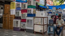 Air-conditioners and air-coolers displayed for sale at a store in New Delhi, India, on Monday, May 8, 2023.