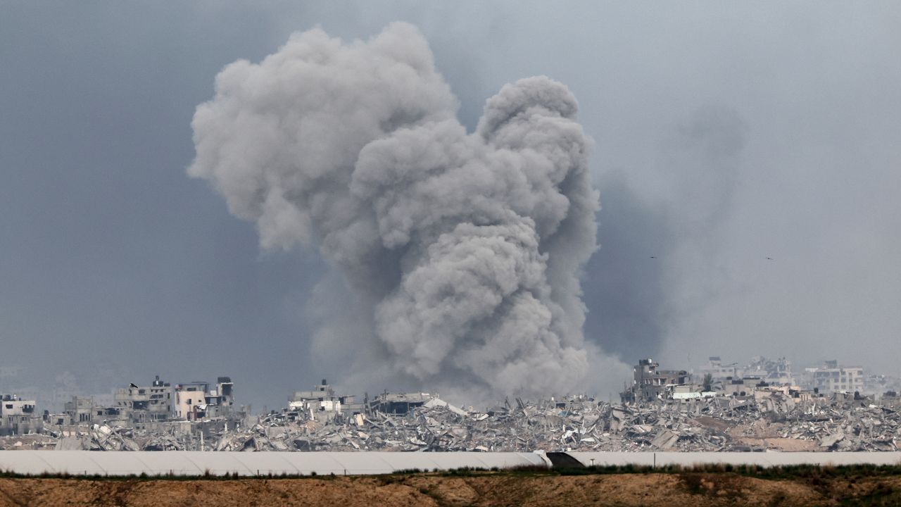 A picture taken from southern Israel near the border with the Gaza Strip on December 21, 2023, shows smoke billowing following Israeli bombardment in the Palestinian territory amid ongoing battles with the Palestinian Hamas militant group.