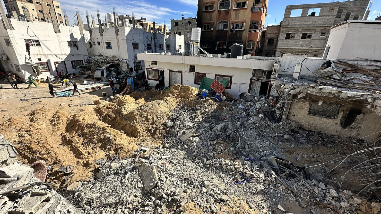 A view of destroyed roads and Kamal Adwan Hospital after Israeli attacks on Beit Lahia, Gaza on December 16, 2023.