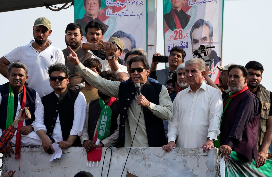 Pakistan's former Prime Minister Imran Khan, center, addresses to his supporters at a rally in Lahore, Pakistan, Saturday, October 29 2022.