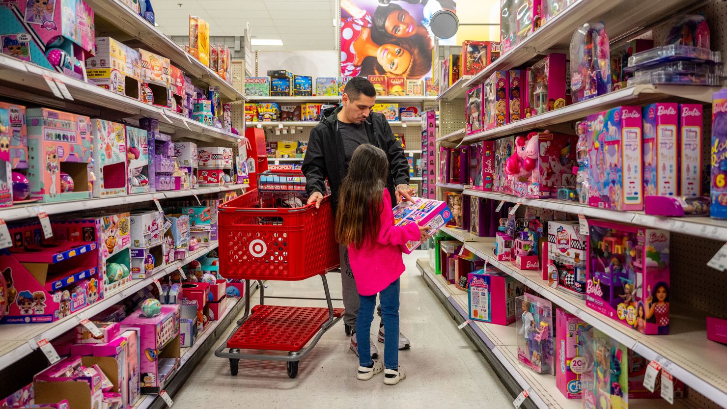 A family shops for holiday gifts in a Target store in Austin, Texas, on December 21.