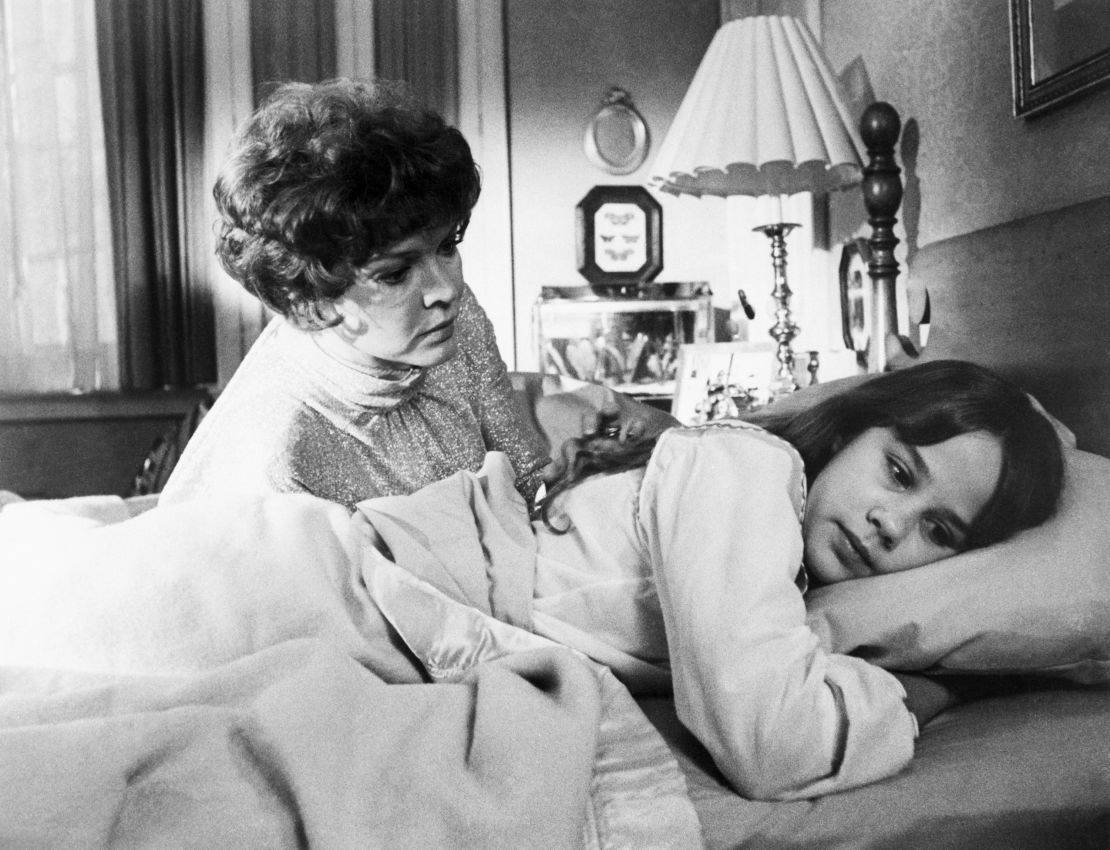 (Original Caption) 1973- Picture shows actress, Ellen Burstyn(R), at the bedside of her daughter, Linda Blair(L), during a scene from the 1973 movie 