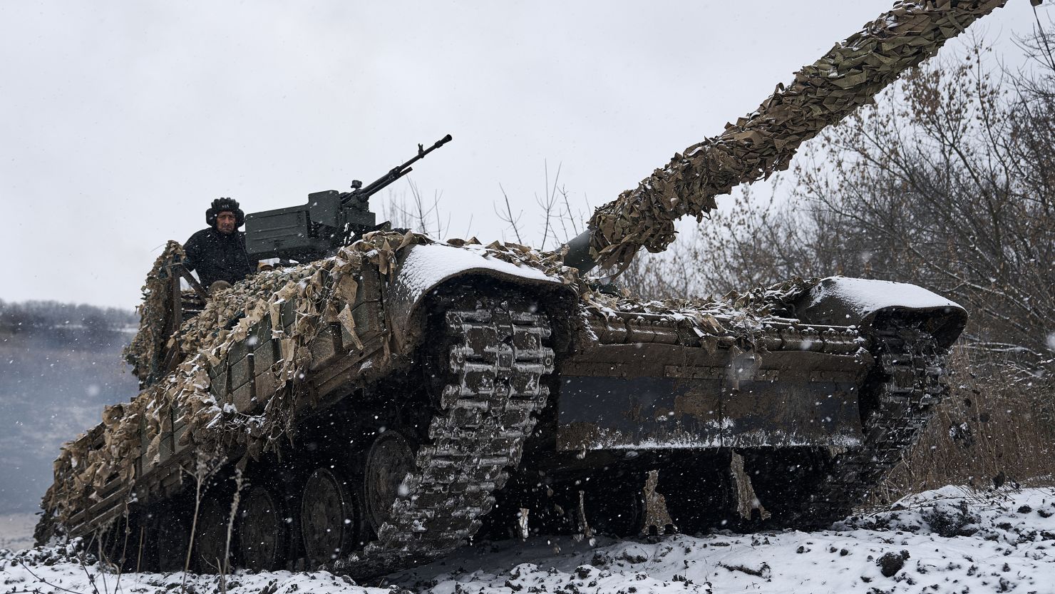 BAKHMUT REGION, UKRAINE - DECEMBER 8:  A Ukrainian T-64 tank goes on combat duty in the area of Bakhmut district on December 8, 2023 in Bakhmut Region, Ukraine.  Ukrainian forces continue to fight to retake Bakhmut, which was captured by Russian forces in May, following a yearlong war battle. Over the summer, Ukraine regained territory north and south of Bakhmut but Russia has held the city itself. (Kostya Liberov/Libkos/Getty Images)